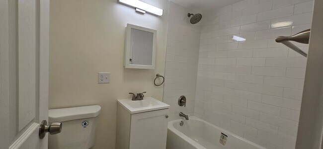Building Photo - Everything is new! Harvard Sq! Walk to T! Large 1bd with balcony! Parking included!