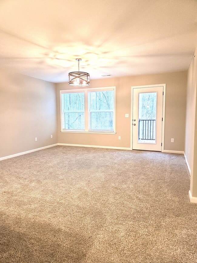 Building Photo - Exquisite just built condo with everything! Ground floor, no stairs, attached garage