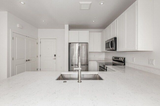 Building Photo - SLOANS LAKE! Brand new condo facing west!