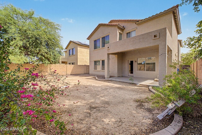 Building Photo - 9442 W Palm Ln