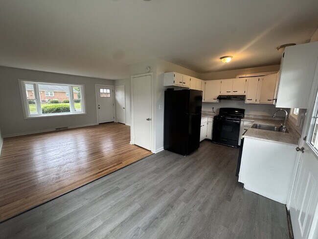 Building Photo - July Only: Submit your application this month and pay a reduced application fee of just $32. Reno...