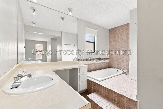 Building Photo - 8917 E Chenango Ave