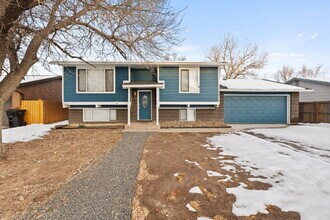 Building Photo - Spacious Split-Level Home with Finished Basement, Deck, Fenced Yard & 2-Car Garage