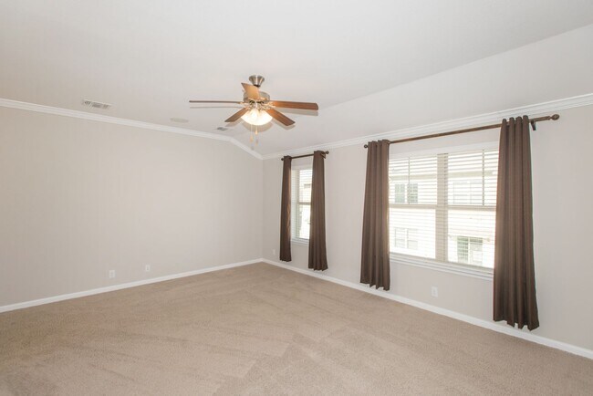 Building Photo - Model Home in City Side Condo Community
