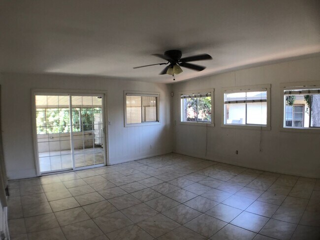 Building Photo - BEAUTIFUL WOOD FLOORS IN THIS 5 BED 2 BATHROOM HOUSE- LARGE DOGS OK