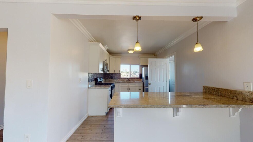 Building Photo - Modern & Spacious Home in East LA – Great Value and Prime Location!