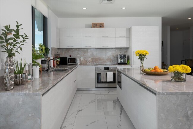 Building Photo - 1300 S Miami Ave