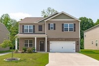 Building Photo - Spacious 5 Bedroom Home with a Fully Fence...