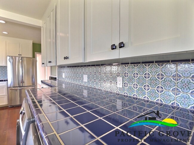 Building Photo - Classic Pacific Grove Charm with Bay Glimpses & Light-Filled Living