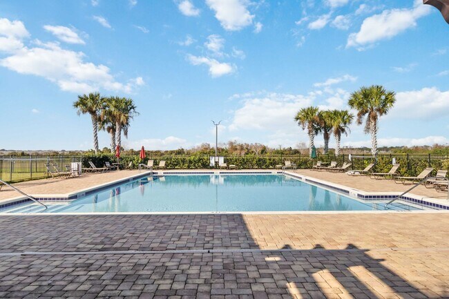 Building Photo - Beautiful Townhome with Private Courtyard & 2-Car Garage Near Lake Nona