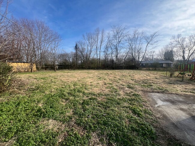 Building Photo - Split Foyer with a Fenced Backyard and a S...