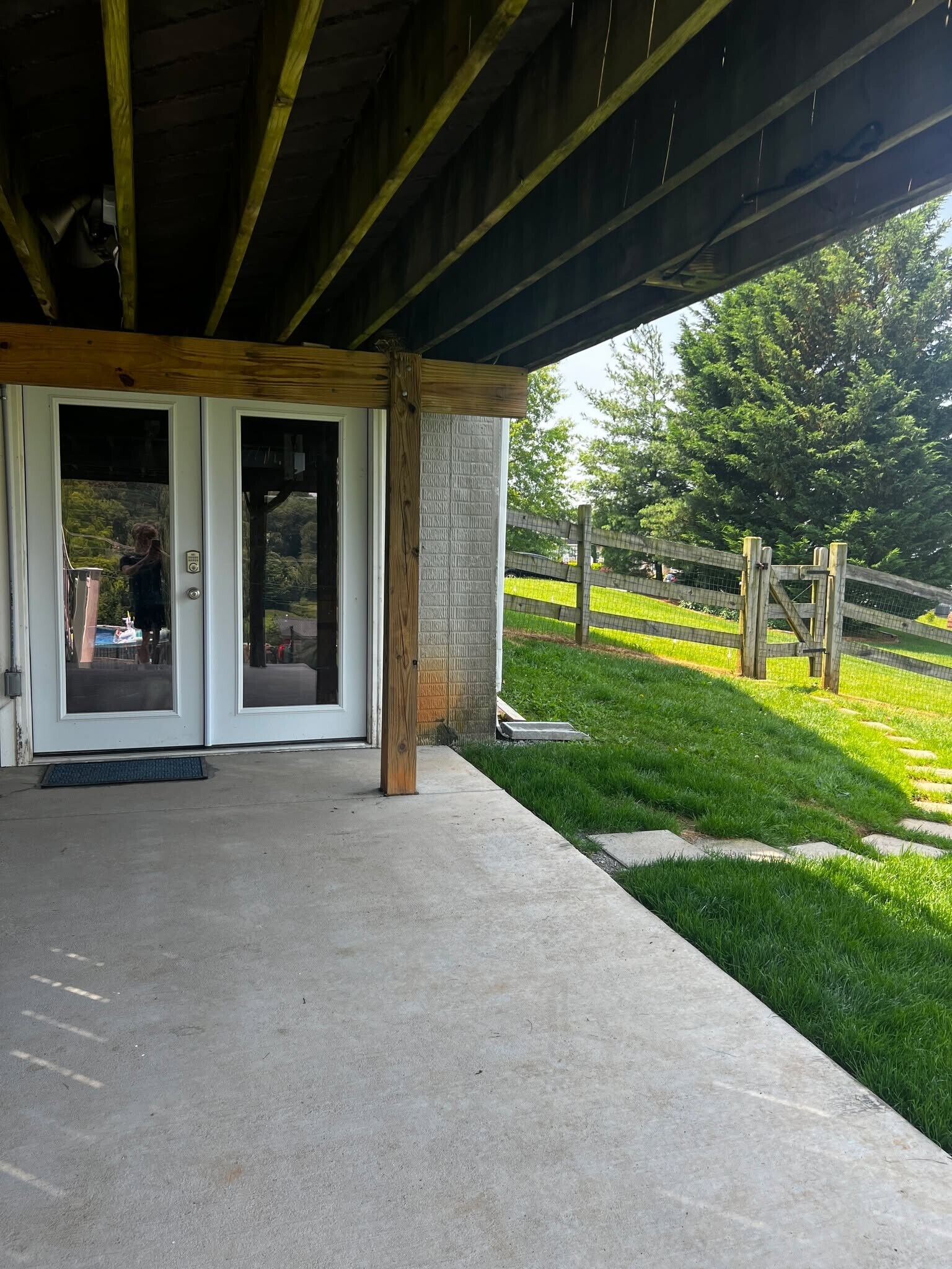 Basement door/patio to stepping stone path - 205 Palomino Dr