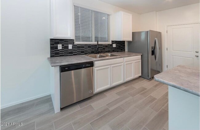 Building Photo - 7243 N 125th Dr