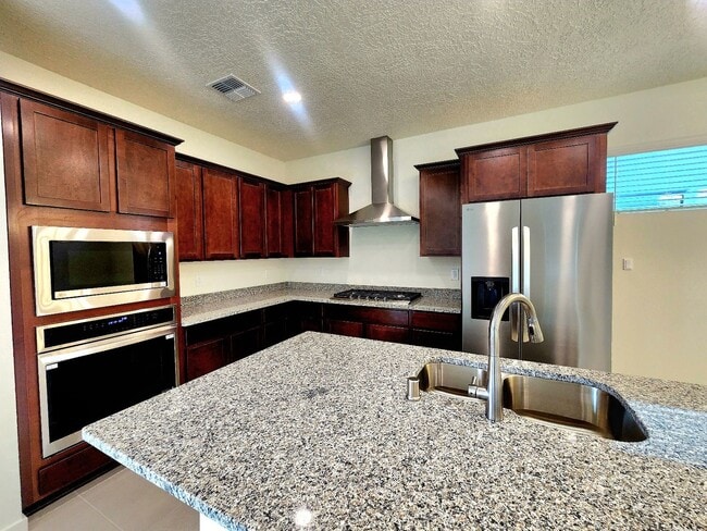 Building Photo - Brand-New Construction Townhome – Never Li...