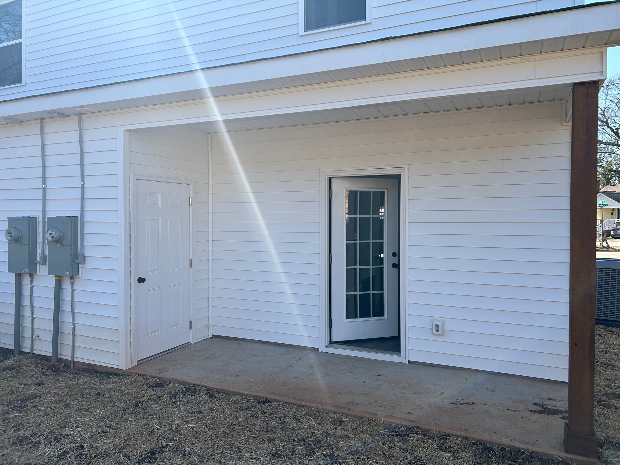 Private patio, with outdoor storage closet, opens to your private back yard - 334 Bailey St