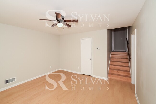 Building Photo - Welcome to this charming abode.