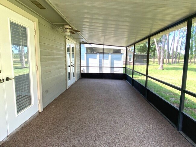 Building Photo - Two Bedroom Pelican BayTownhome