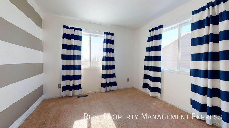Building Photo - Spacious 4 Bedroom 2 Bath Home with attach...
