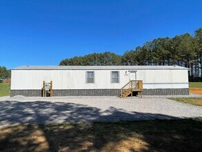 Building Photo - 3 BED 2 BATH MOBILE HOME IN GATED COUNTRY ...