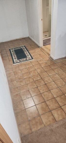 Downstairs dining room tile floor2 - 2116 Thaler Ave