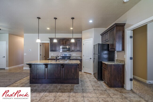 Building Photo - Dog Friendly, Pleasant 4 Bedroom, 2.5 Bathroom Townhome