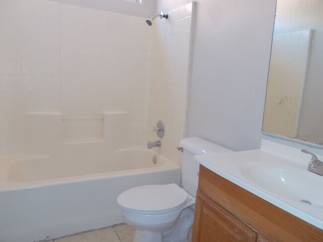 Building Photo - Spacious 4-Bedroom, 2.5-Bathroom Home with...