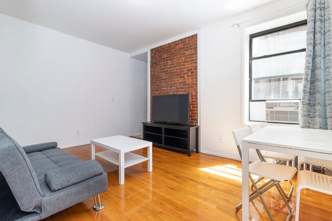 Building Photo - 306-318-318 E 96th St