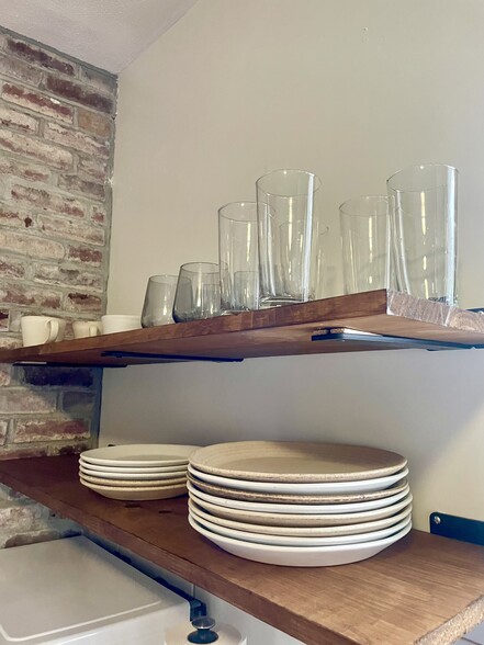 A close up of open shelving here - it provides an airy feel to the kitchen. - 186 Linwood St