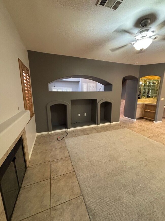 Building Photo - Gated Green Valley Ranch Townhome | 2 Bed | 2.5 Bath | 2-Car Garage