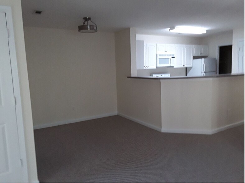 Dining room adjacent to kitchen - 100 Kensington Blvd
