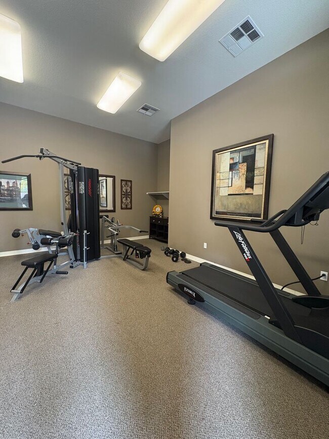 Building Photo - Stunning Home in a Desirable Gated Community