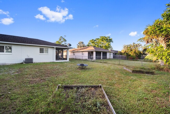 Building Photo - ANNUAL RENTAL - 2 Bedroom, 1 Bath w/ Garag...