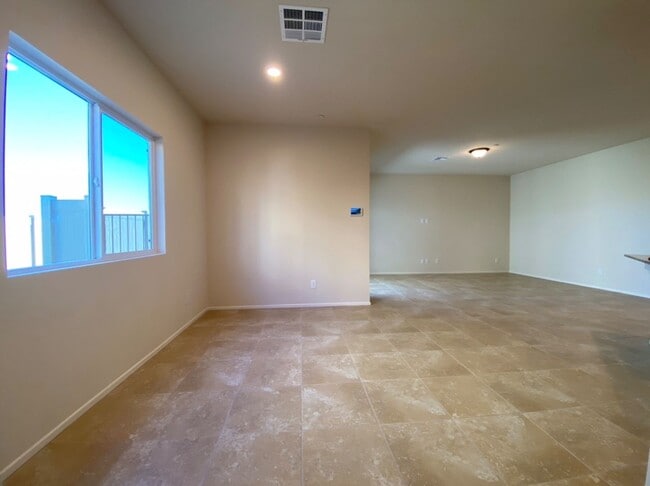 Building Photo - 4 BED 3 BATH Townhome, 1 LOFT, 2 GARAGES, GATED!