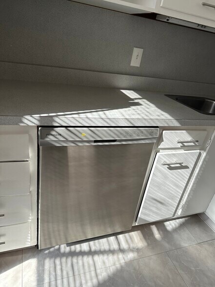 New dishwasher and fridge - 3808 Flad Ave