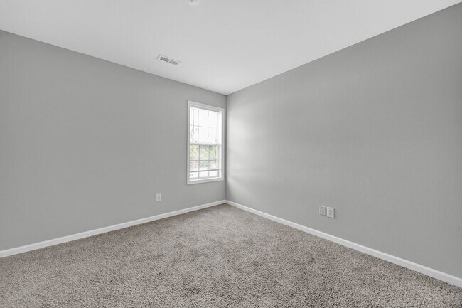 Building Photo - Two-story Condominium with Easy Highway Ac...