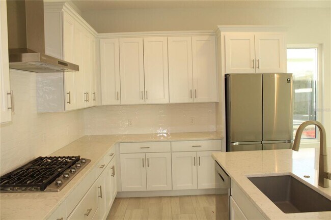 Building Photo - 6311 Pigeon Plum Way