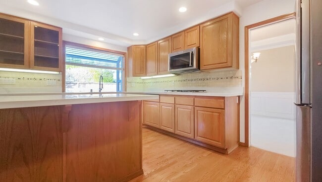 Building Photo - Spacious Updated 4 Bedroom Home with 3 Car Garage