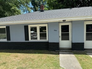 Building Photo - EBattle305-307-309