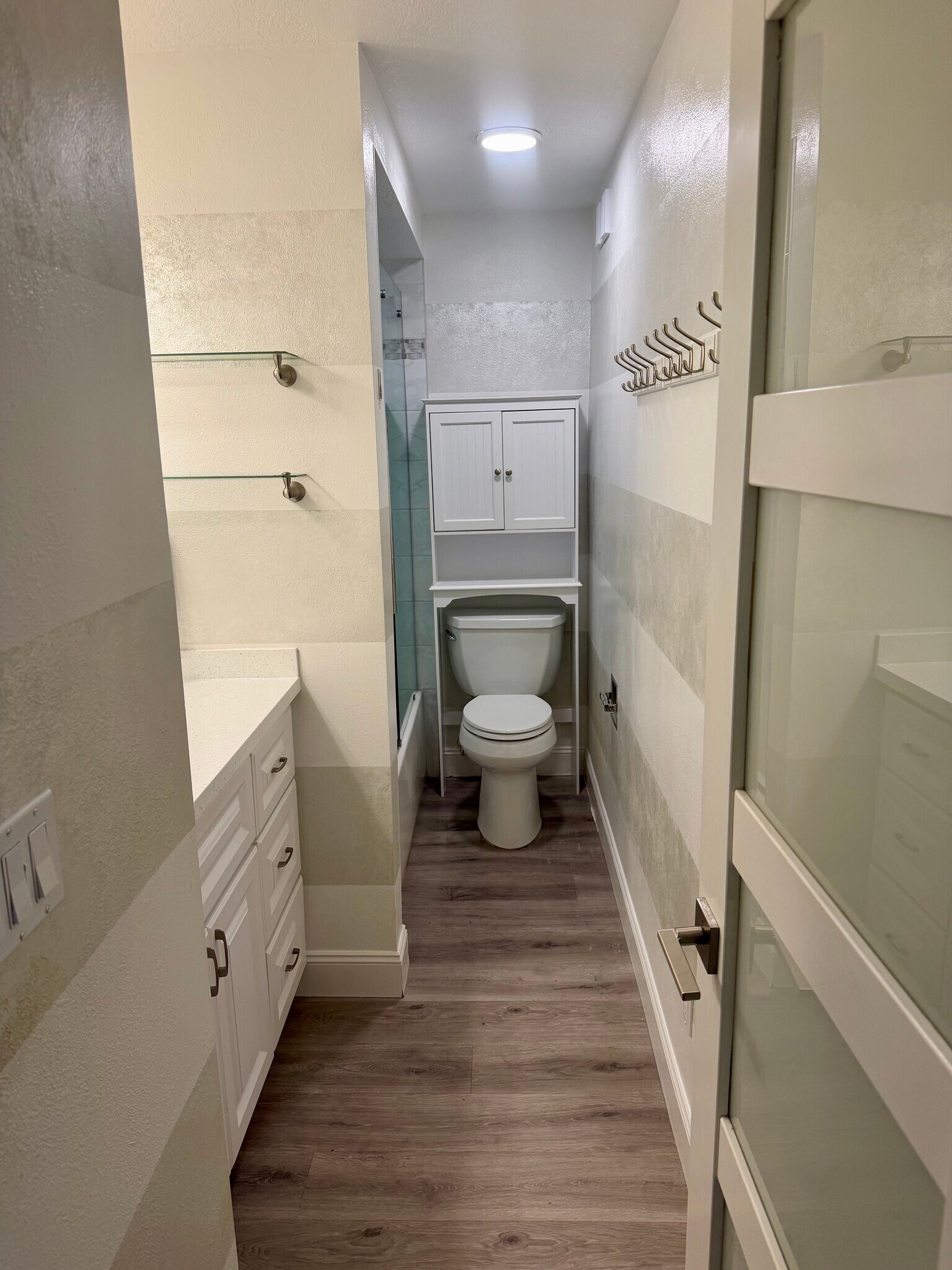 Full bathroom and storage - 105 4th Ave NE