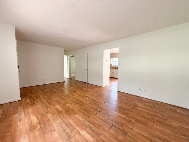 Building Photo - 2-Bedroom Home with Bonus Room & Large Wooden Deck | Pet-Friendly Near I-40 & City Lake