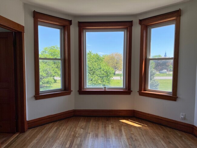 Beautiful trees, park, and sunrises out the East facing bay windows - 888 N Sacramento Blvd