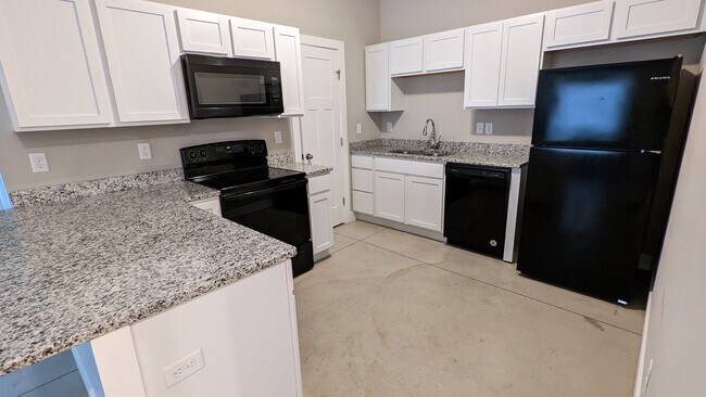 Building Photo - 8070 E 34th Ct S