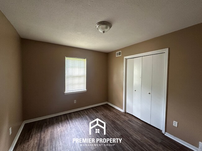 Building Photo - Move-In Ready 4BR Home in 38134 - Airy Living Spaces & Private Backyard