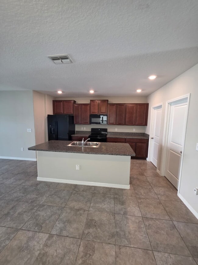 Building Photo - 7418 Rosy Periwinkle Ct