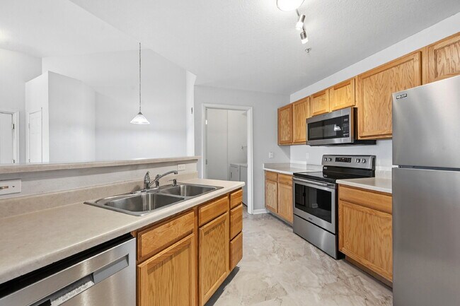 Building Photo - $1,595.95, 1 Bed, 1 Bath Condo in Aurora with In Unit Laundry and Pool Access!