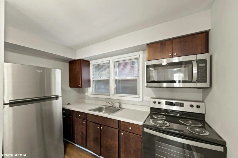 Building Photo - 7617 S Colfax Ave