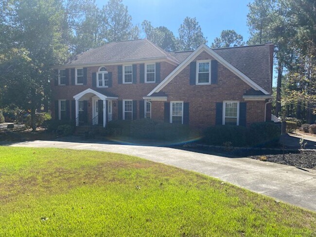 Building Photo - Gorgeous 5 Bedroom 3 Bathroom Brick Home in Woodside Plantation!
