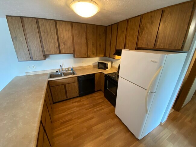 Kitchen with Ample Cabinets - 2543 Neil Armstrong Dr