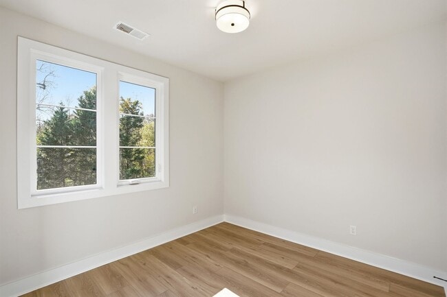 Building Photo - Bishop at Briar Creek, an end-unit townhome