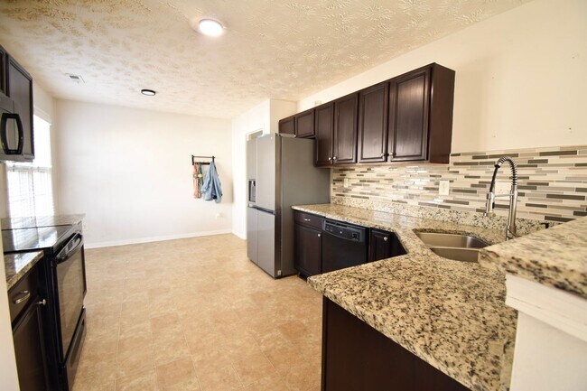Building Photo - Coming Soon-4 Bedroom 2 Bathroom, Small Pets Considered